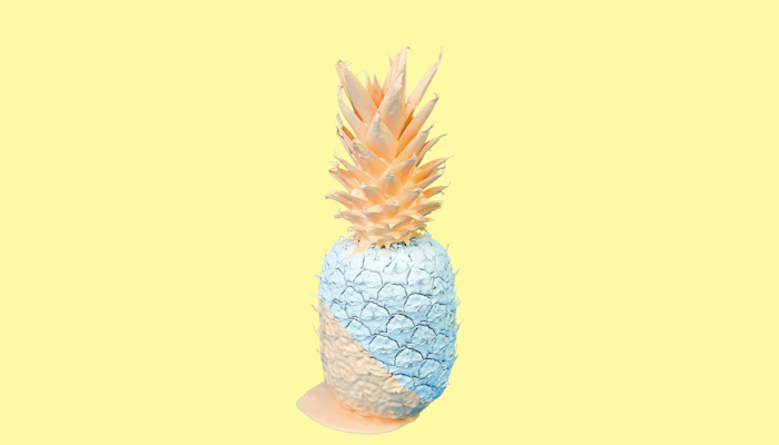 Pineapple with a solid color background